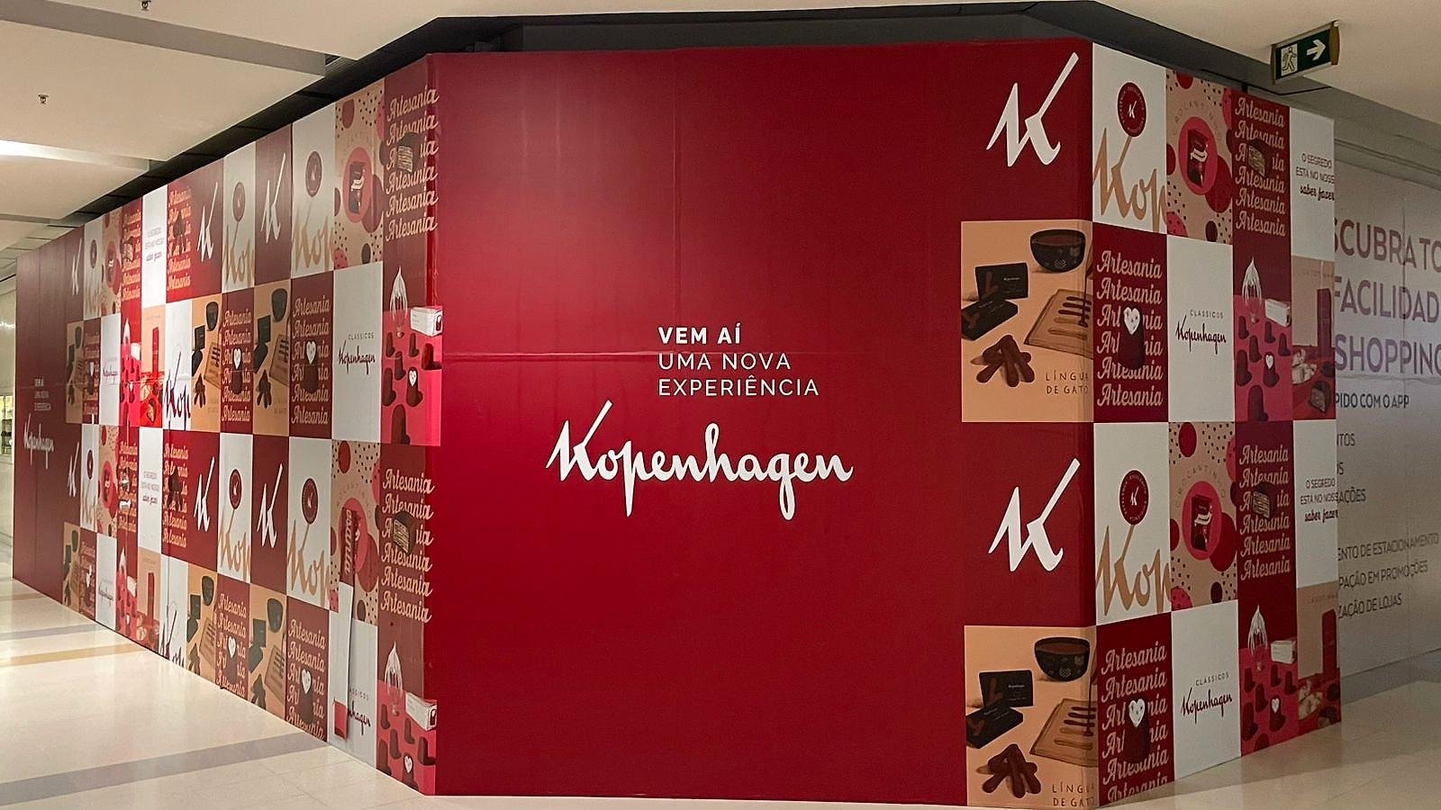 Tapume vermelho da Kopenhagen: "Vem aí uma nova experiência"